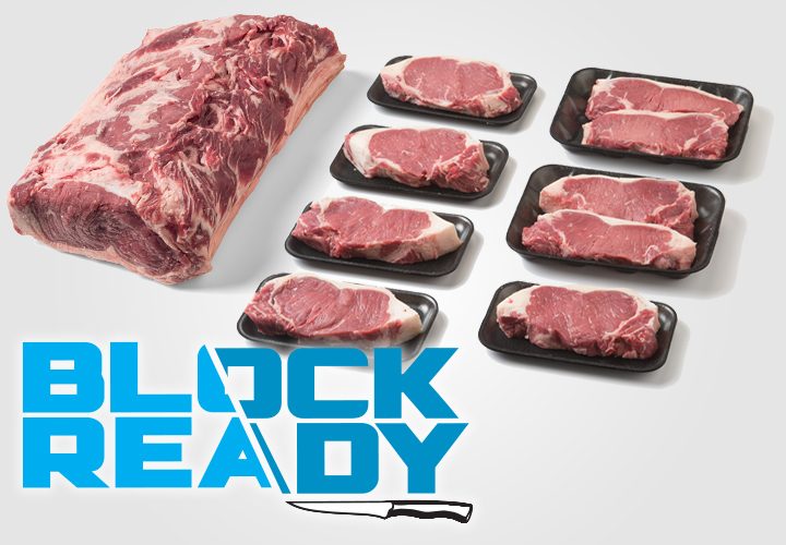 Block Ready whole beef loin with several sliced steaks arranged beside it.
