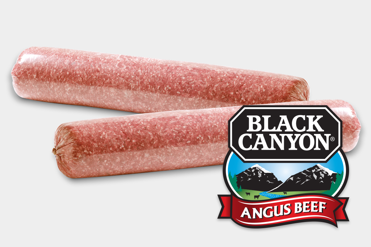 Two long chubs of raw ground beef with Black Canyon Angus Beef logo