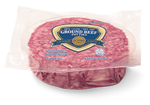 Vacuum-sealed single ground beef patty with a product label on the front.