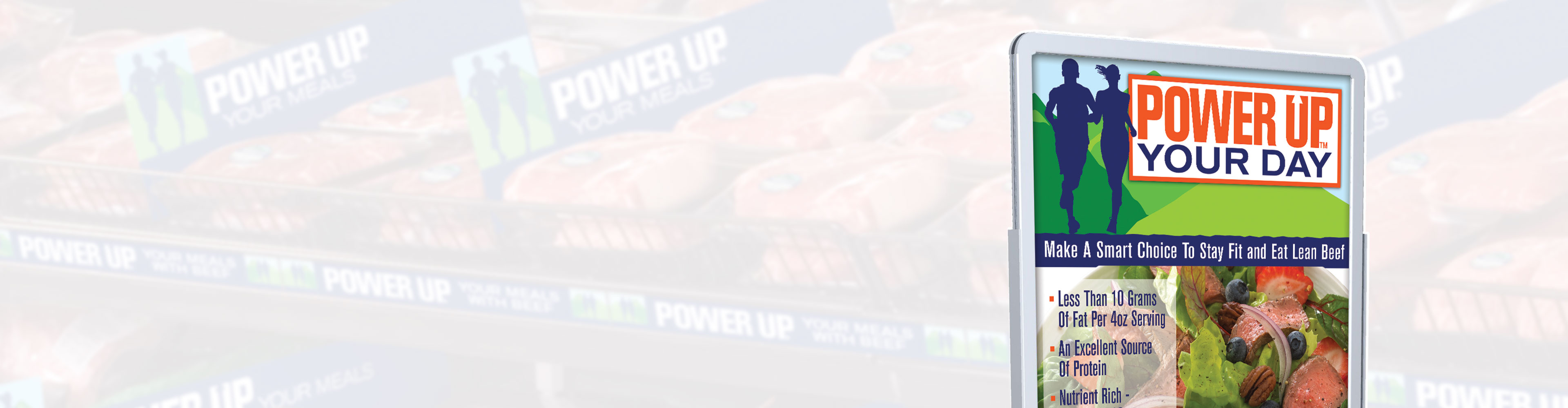 In-store sign promoting lean beef with Power Up Your Day branding.