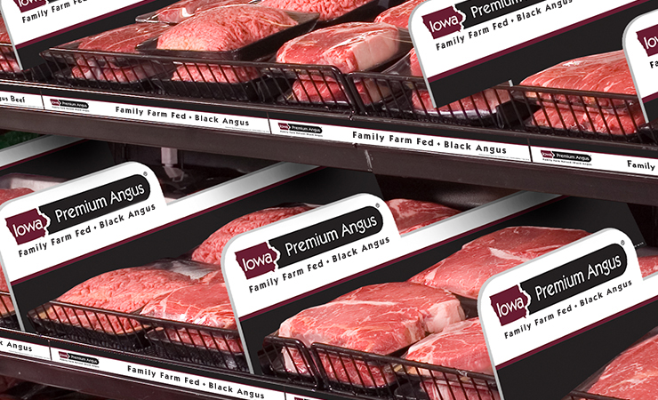 Shelves stocked with packaged cuts of Iowa Premium Angus beef.