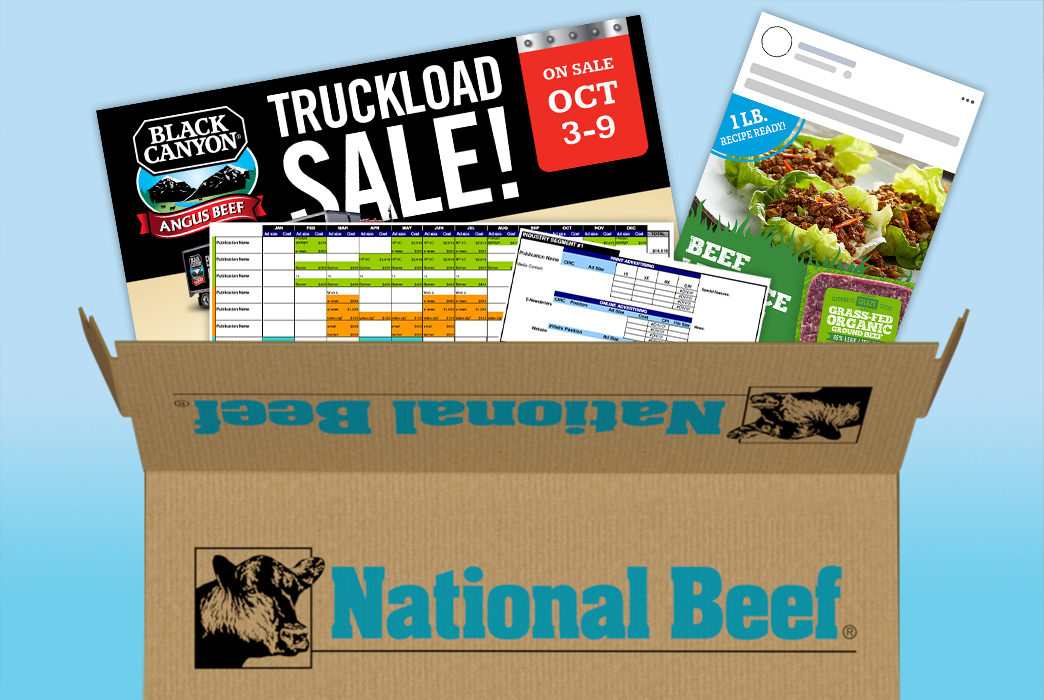 A cardboard box labeled “National Beef” filled with promotional materials including steak sale flyers, charts, and beef product images.