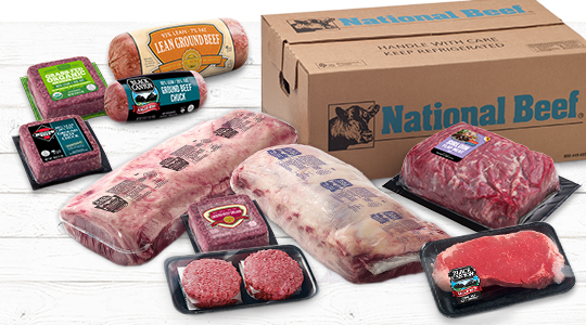 Box labeled “National Beef” with assorted packaged cuts of raw beef displayed in front.