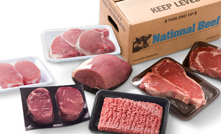 Packaged cuts of beef displayed beside a National Beef box.