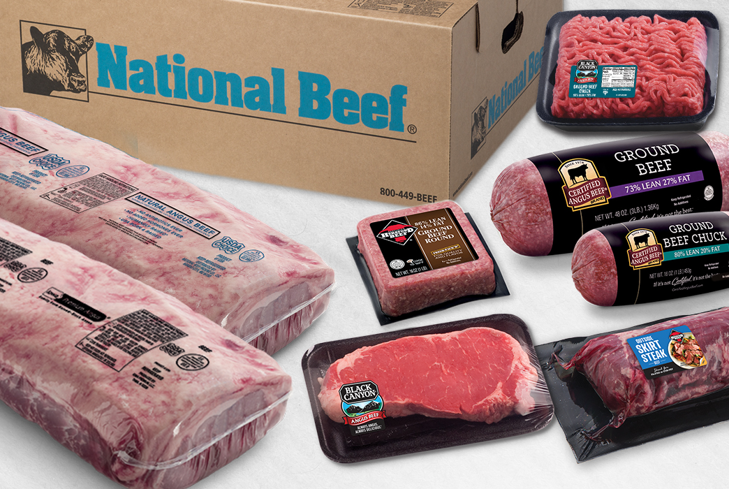 Assorted packaged beef cuts and ground beef in a National Beef box.