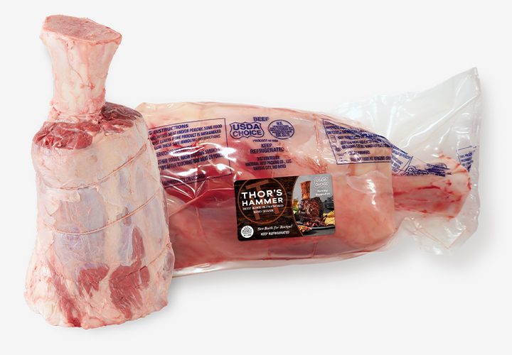 Raw Thor’s Hammer beef shank in clear packaging labeled with product details.