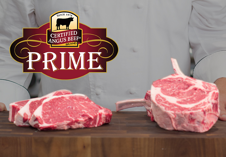 Two premium ribeye steaks displayed on cutting board with Certified Angus Beef® Prime logo above.