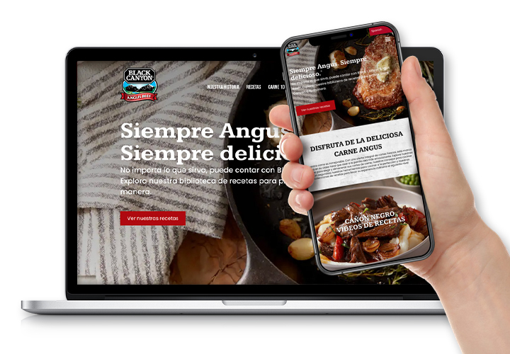 Smartphone and laptop displaying the Black Canyon Angus Beef consumer website.