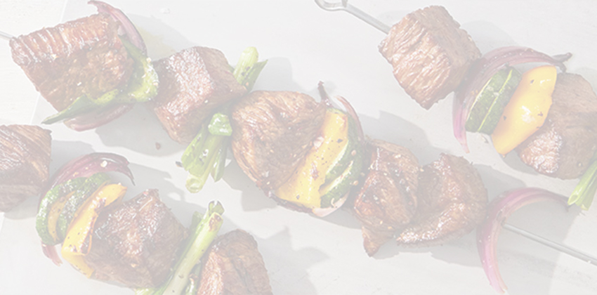 Steak and vegetable skewers.