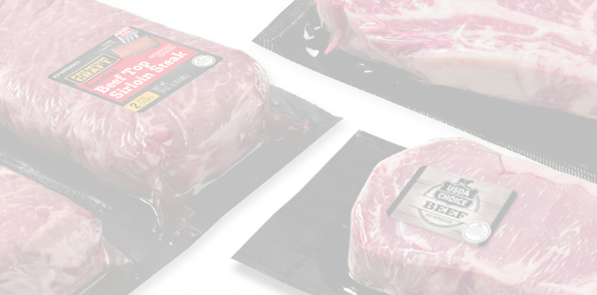 Vacuum-sealed beef steaks displayed on a white background, showing different cut and label options.