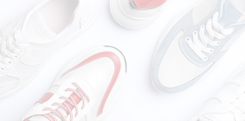 Various athletic shoes in white, red, and blue displayed on a light background.